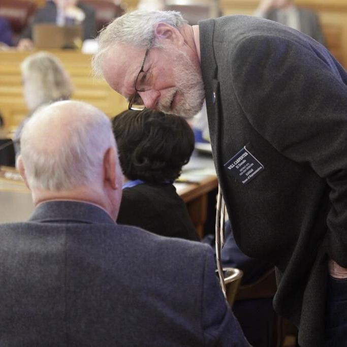 Fight over Kansas budget surplus: How much gets socked away?